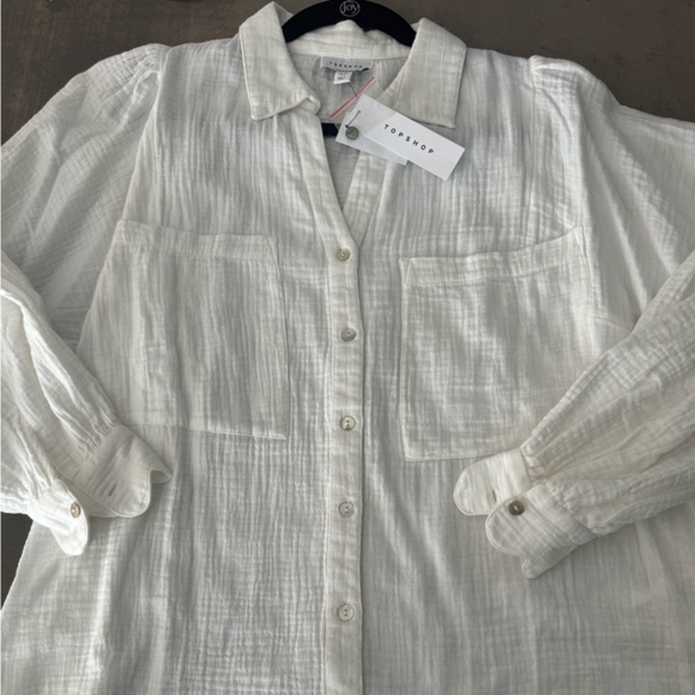 TOPSHOP white blouse with cute design details( fun fabric too) and a pocket🤍